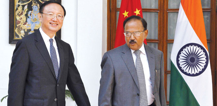 Chinau2019s State Councillor Yang Jiechi (left) and Indiau2019s National Security Adviser Ajit Doval arrive for a photo opportunity before their meeting in Ne