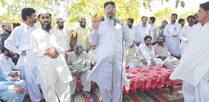 Radical Sunni cleric Maulana Ahmed Ludhianvi addresses his supporters during his election campaign in Jhang, Punjab province, on April 16.
