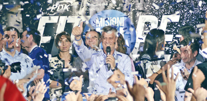 Thaci acknowledges his supporters after the party claimed victory in Pristina.