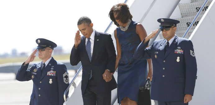President Barack Obama and first lady Michelle Obama arrive in New York, where Obama will attend the United Nations General Assembly.