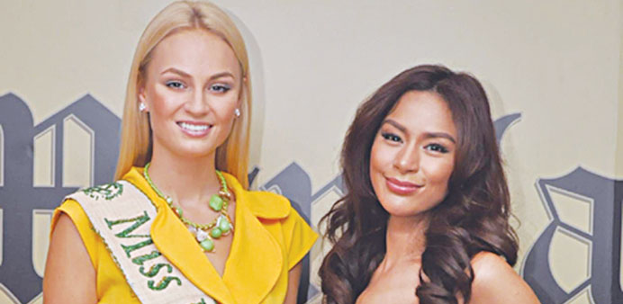 Miss Earth 2012 winner Tereza Fajksova (left) and Miss Earth Philippines 2013 Angelee Delos Reyes at the Manila Times office yesterday.