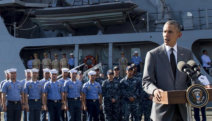 Barack Obama speaks following a tour of the BRP Gregario Del Pilar in Manila Harbour on Tuesday after arriving to attend the Apec summit. 